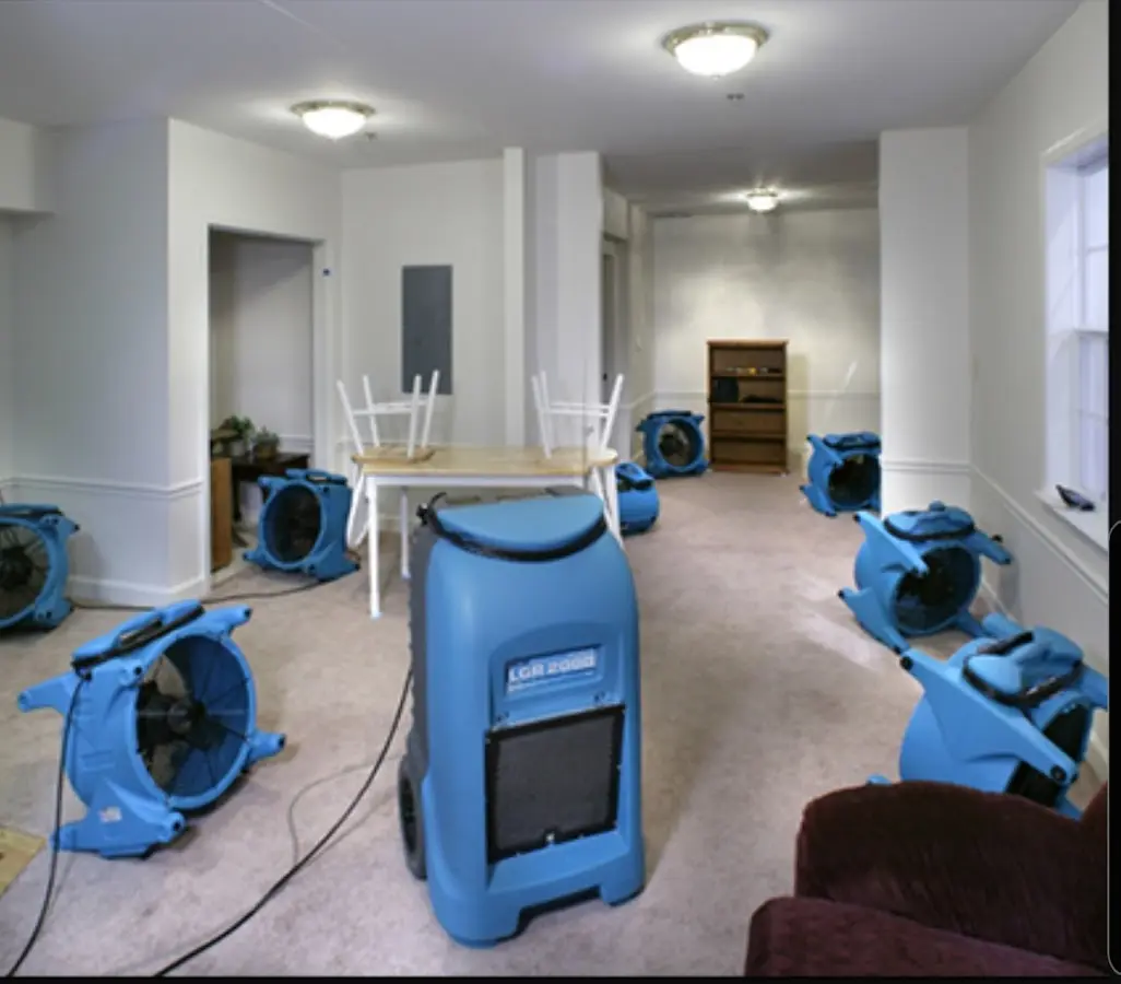 Air movers and dehumidifier setup for Water Extraction & Removal in Charlton